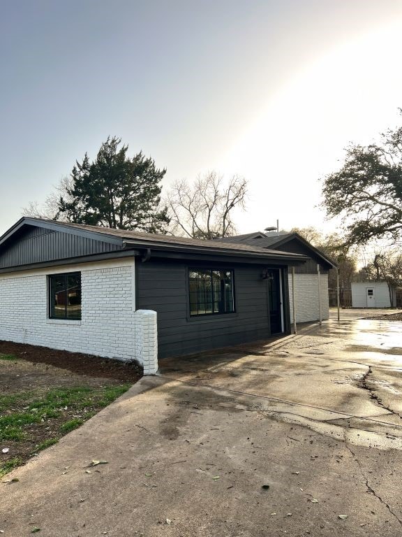 view of front of home with brick siding