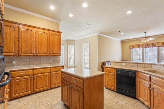 kitchen featuring sink, dishwasher, backsplash, a center island, and ornamental molding