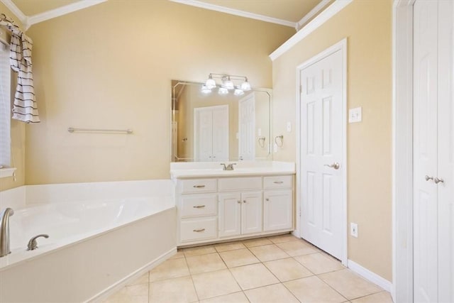 bathroom with tile patterned flooring, vanity, ornamental molding, and a tub