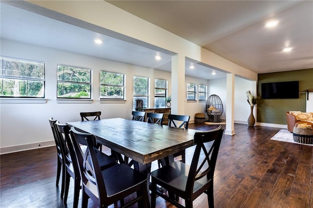 dining space featuring dark hardwood / wood-style floors