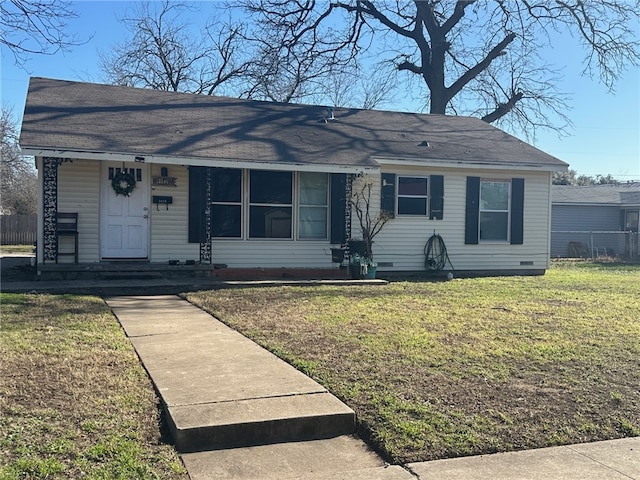 ranch-style home with crawl space, a front lawn, and fence