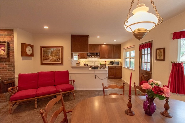 dining area featuring crown molding