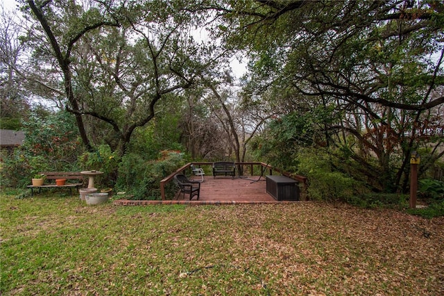 view of yard with a wooden deck