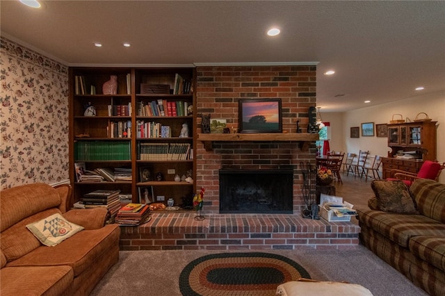 living room featuring a fireplace, carpet, and ornamental molding