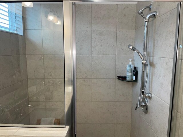 bathroom featuring walk in shower