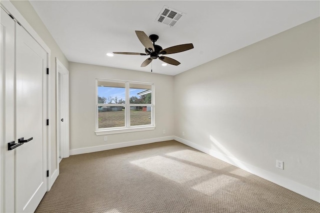 unfurnished bedroom with ceiling fan and carpet