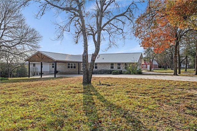 single story home with a patio area and a front lawn