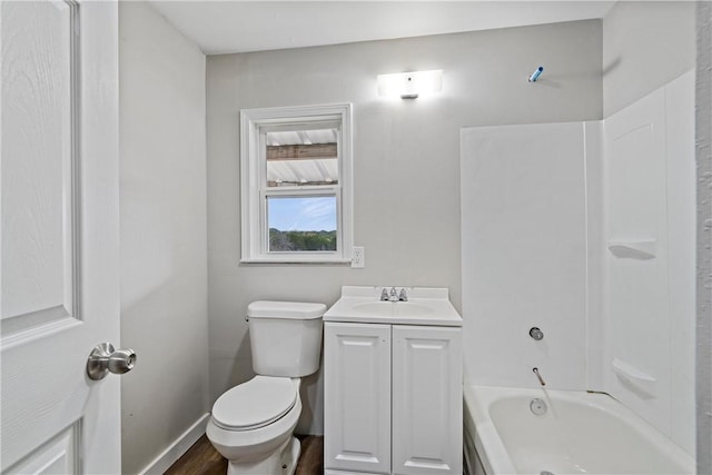 full bathroom featuring hardwood / wood-style floors, vanity, toilet, and shower / bath combination