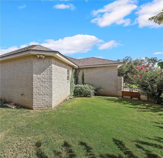 view of property exterior featuring a yard