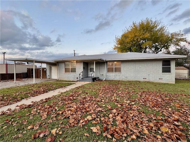 view of front of property with a carport