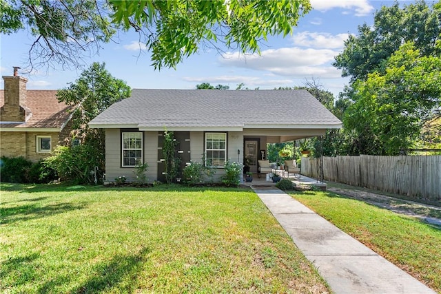 view of front of home with a front lawn