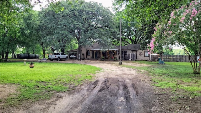 view of front of home featuring a front lawn