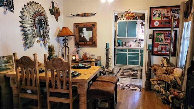 dining space featuring hardwood / wood-style flooring