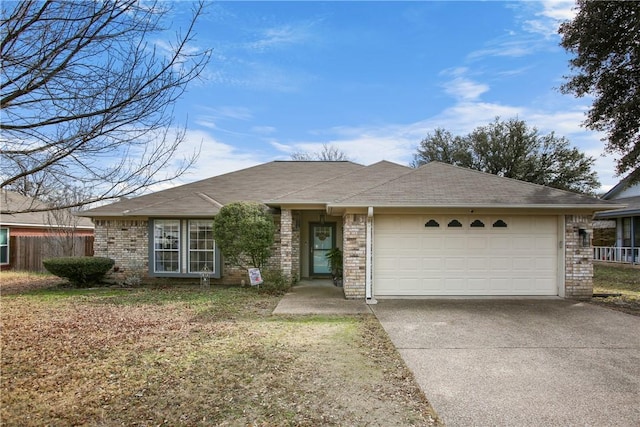 ranch-style home featuring a garage and a front lawn