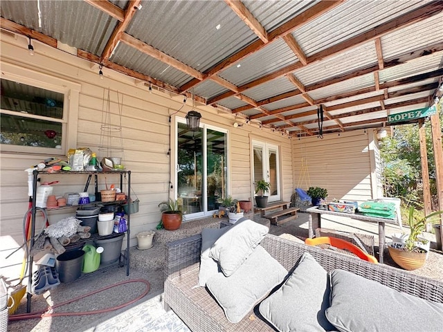 view of patio with an outdoor living space and french doors