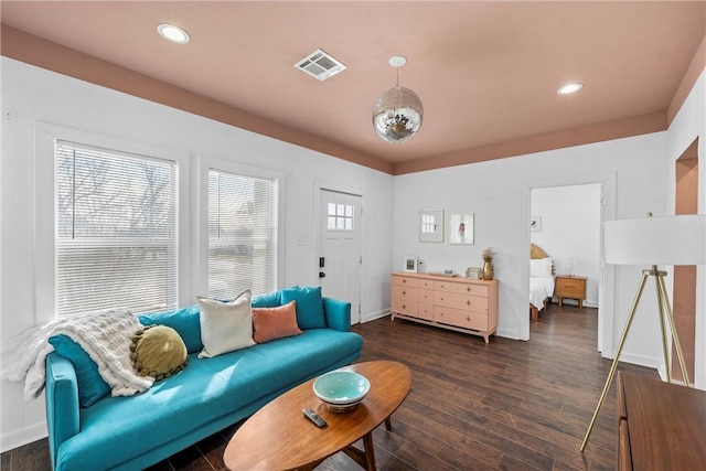 interior space with recessed lighting, visible vents, baseboards, and wood finished floors