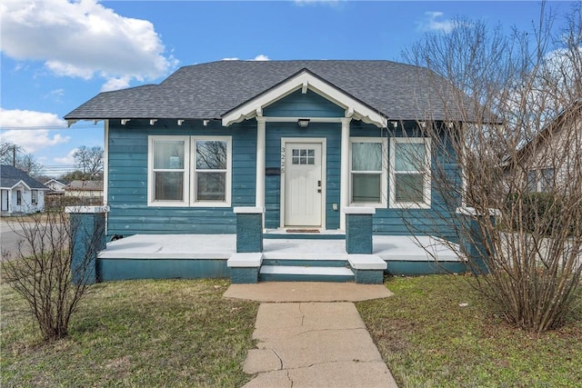 bungalow with roof with shingles