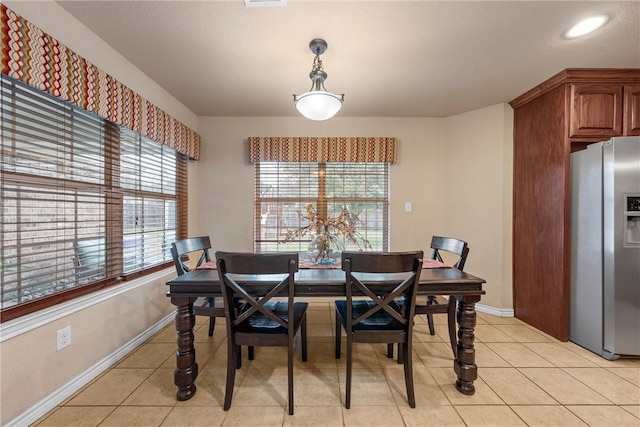 view of tiled dining room