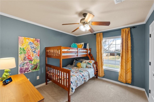 bedroom with ceiling fan, ornamental molding, and light carpet