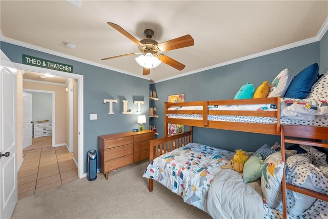 carpeted bedroom with crown molding and ceiling fan