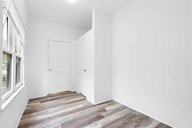 spare room featuring light hardwood / wood-style floors