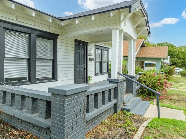 doorway to property with a porch