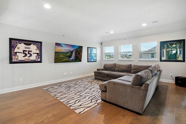 living room with dark hardwood / wood-style floors