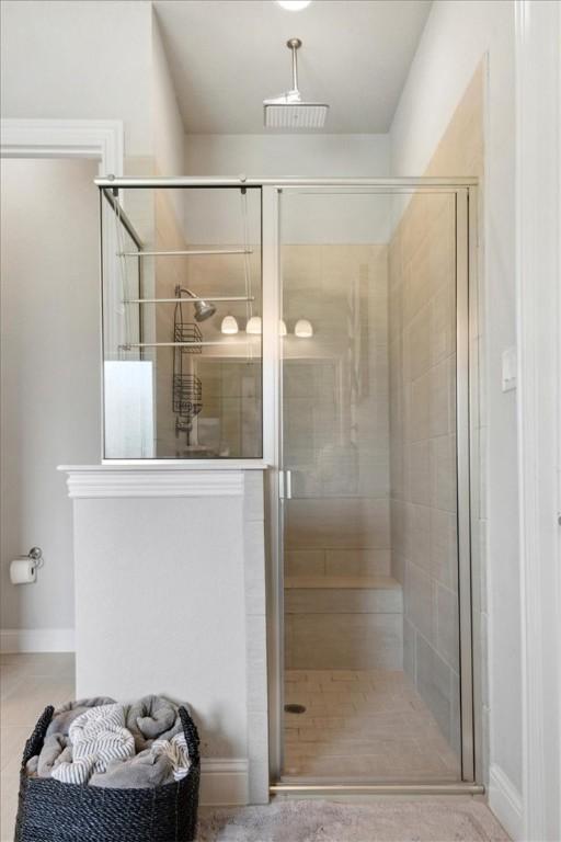 bathroom with an enclosed shower