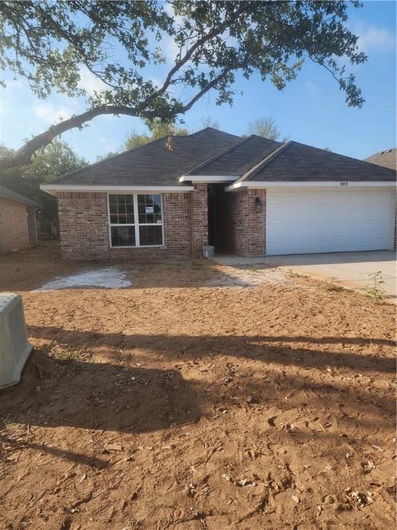 ranch-style home with a garage