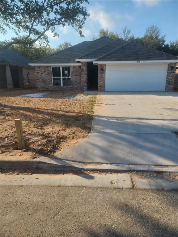 ranch-style house with a garage