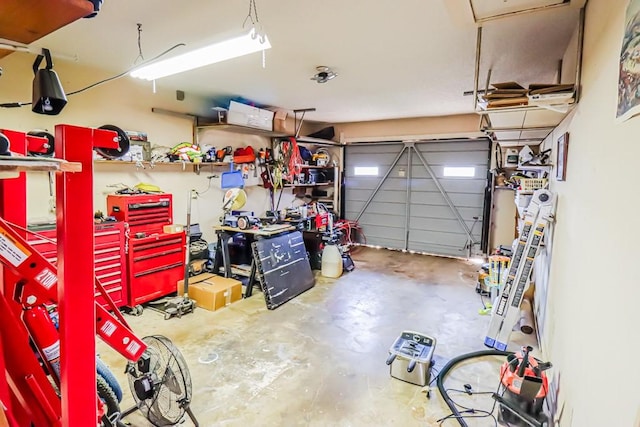 garage with a workshop area