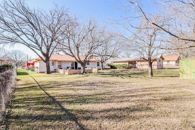 view of yard with fence