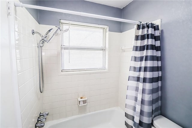 full bathroom with shower / bath combination with curtain and toilet