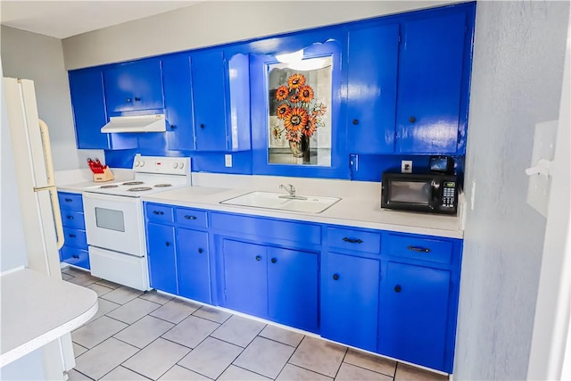 kitchen featuring white appliances, under cabinet range hood, light countertops, and a sink