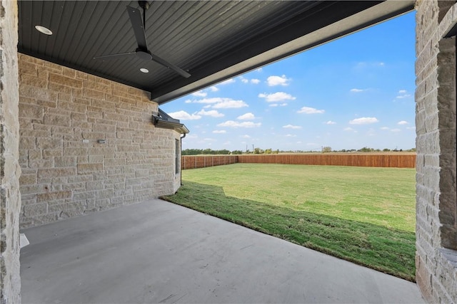 view of patio / terrace featuring ceiling fan