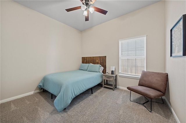 bedroom with ceiling fan and carpet floors