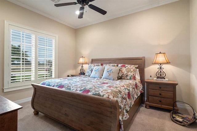 bedroom with ceiling fan, light colored carpet, and ornamental molding