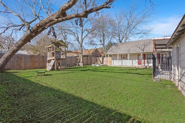 view of yard with a playground