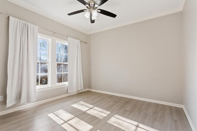 unfurnished room with light hardwood / wood-style flooring, ceiling fan, and ornamental molding