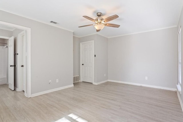 unfurnished room featuring ceiling fan, light hardwood / wood-style floors, and ornamental molding