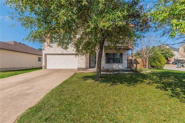 obstructed view of property featuring a garage and a front yard