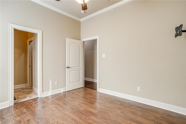 unfurnished bedroom featuring wood-type flooring, ceiling fan, and ornamental molding