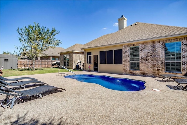 view of swimming pool featuring a patio