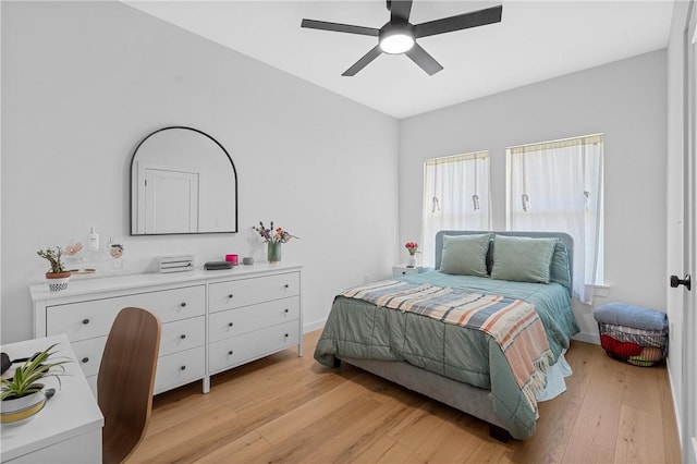 bedroom featuring ceiling fan and light hardwood / wood-style floors