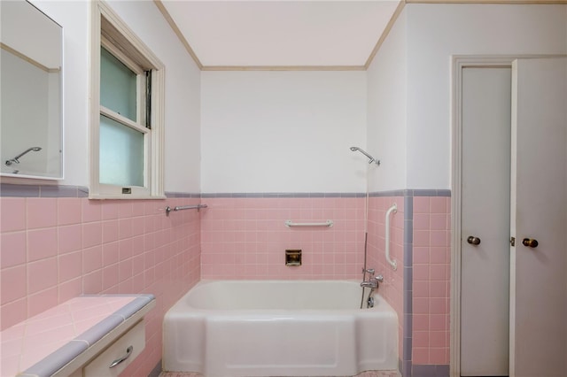 bathroom featuring a bathing tub and tile walls