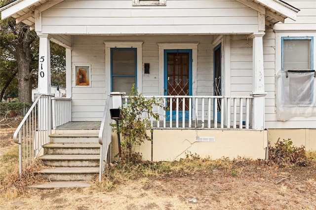 property entrance with a porch