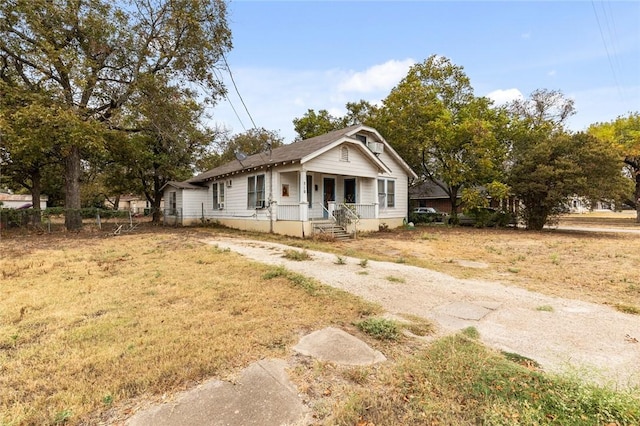 bungalow featuring covered porch