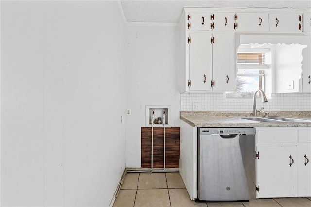 kitchen with white cabinetry, stainless steel dishwasher, sink, and decorative backsplash