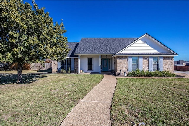 ranch-style home featuring a front yard