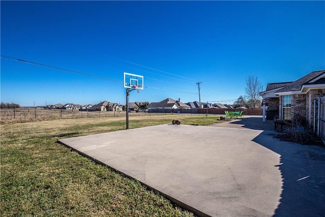 view of patio / terrace featuring basketball hoop